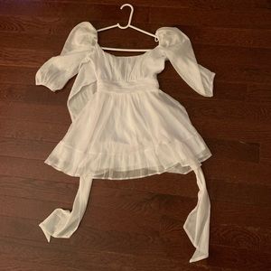 Women’s white baby doll tunis shirt